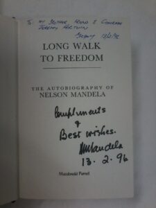 Signed by Mandela with inscription